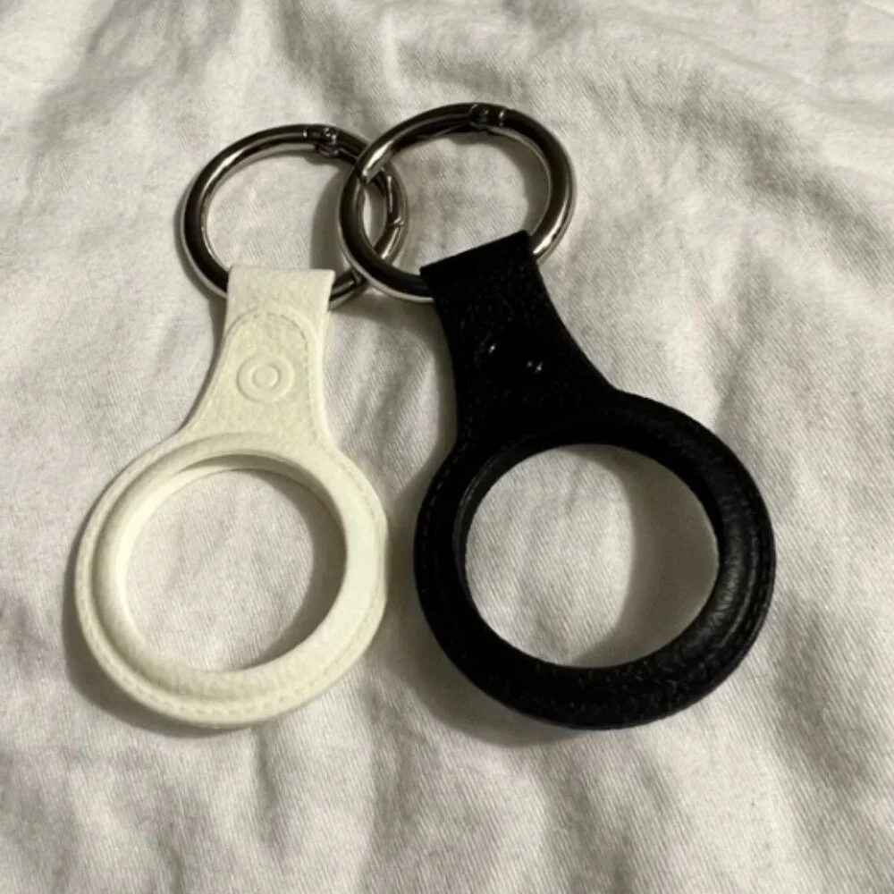 Air tag holders, 2 pack, new, black and white, Moko Brand